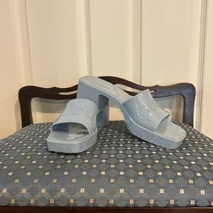 Gucci rubber sandals.